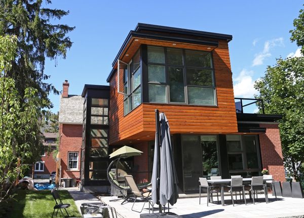 Cedar-clad modern addition by Sirois & Sons